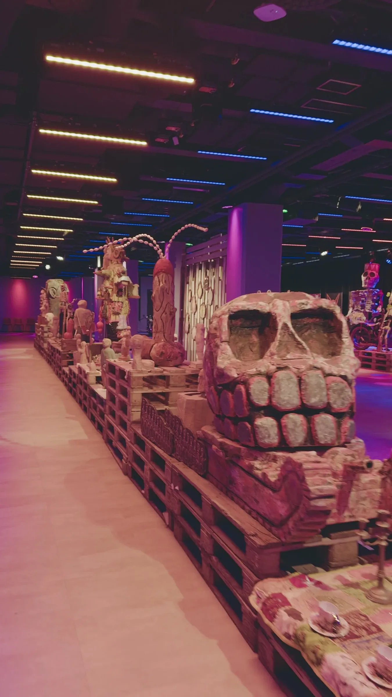 Video: slow pan across the pallet platform with the big skull and the figures