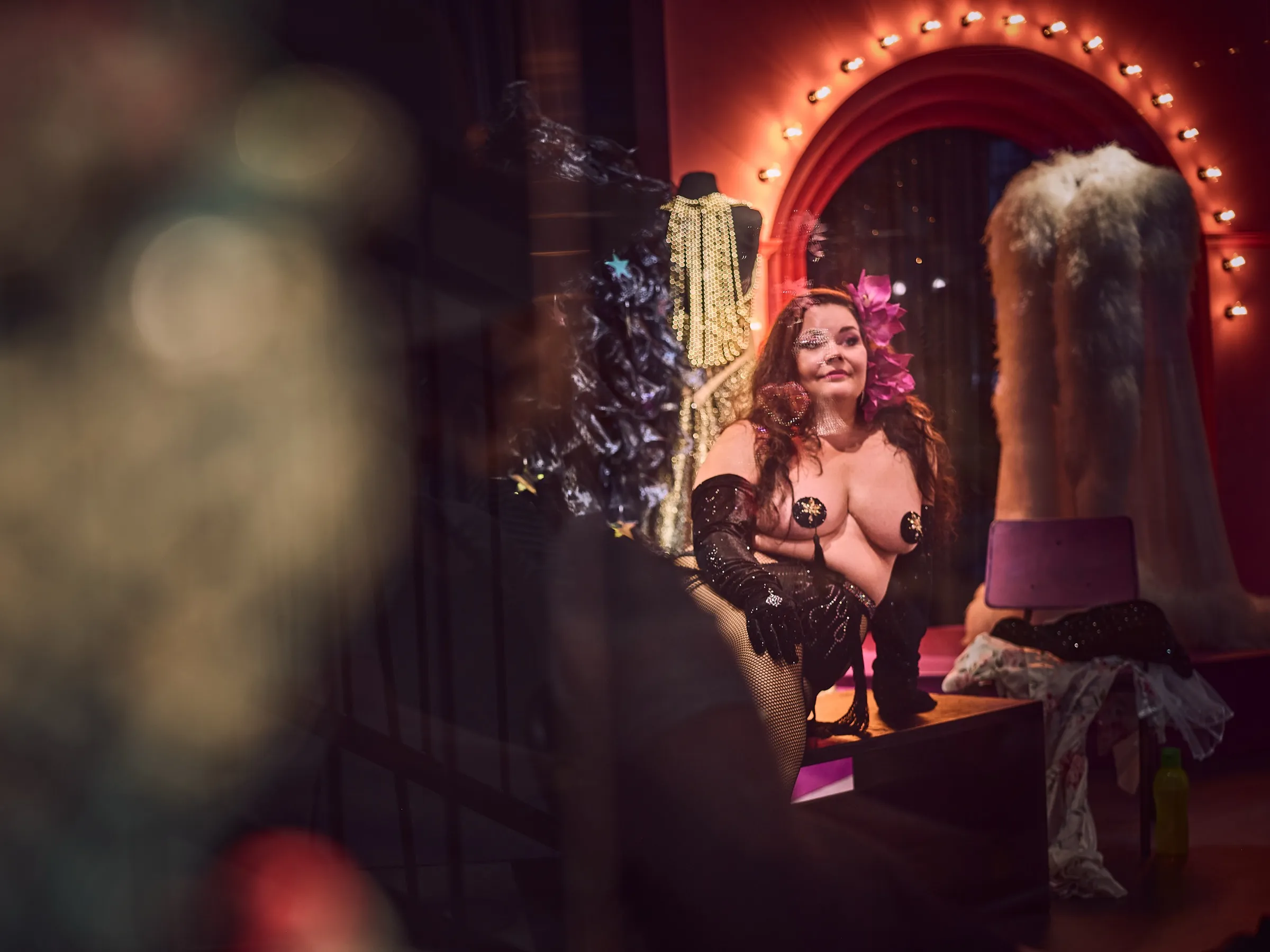 Close view of Lady Misty May as a model, through glass and reflections